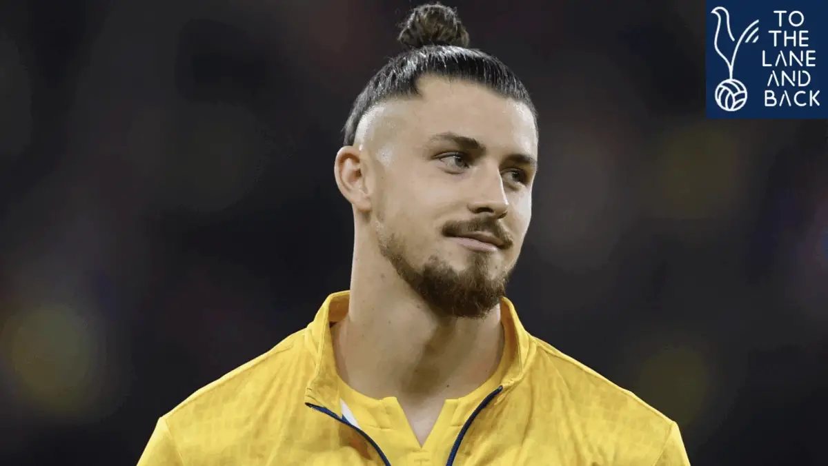 Radu Dragusin in action for Tottenham, facing an uncertain future as transfer rumors swirl around Inter Milan and Napoli
